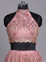 Pastel pink silk lehenga choli with embellished festive detailing