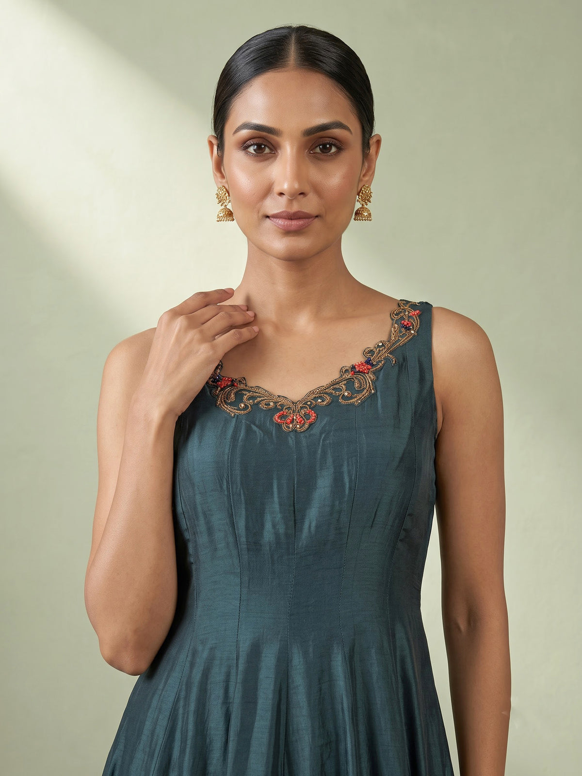 Peacock green silk anarkali suit with embellished dupatta