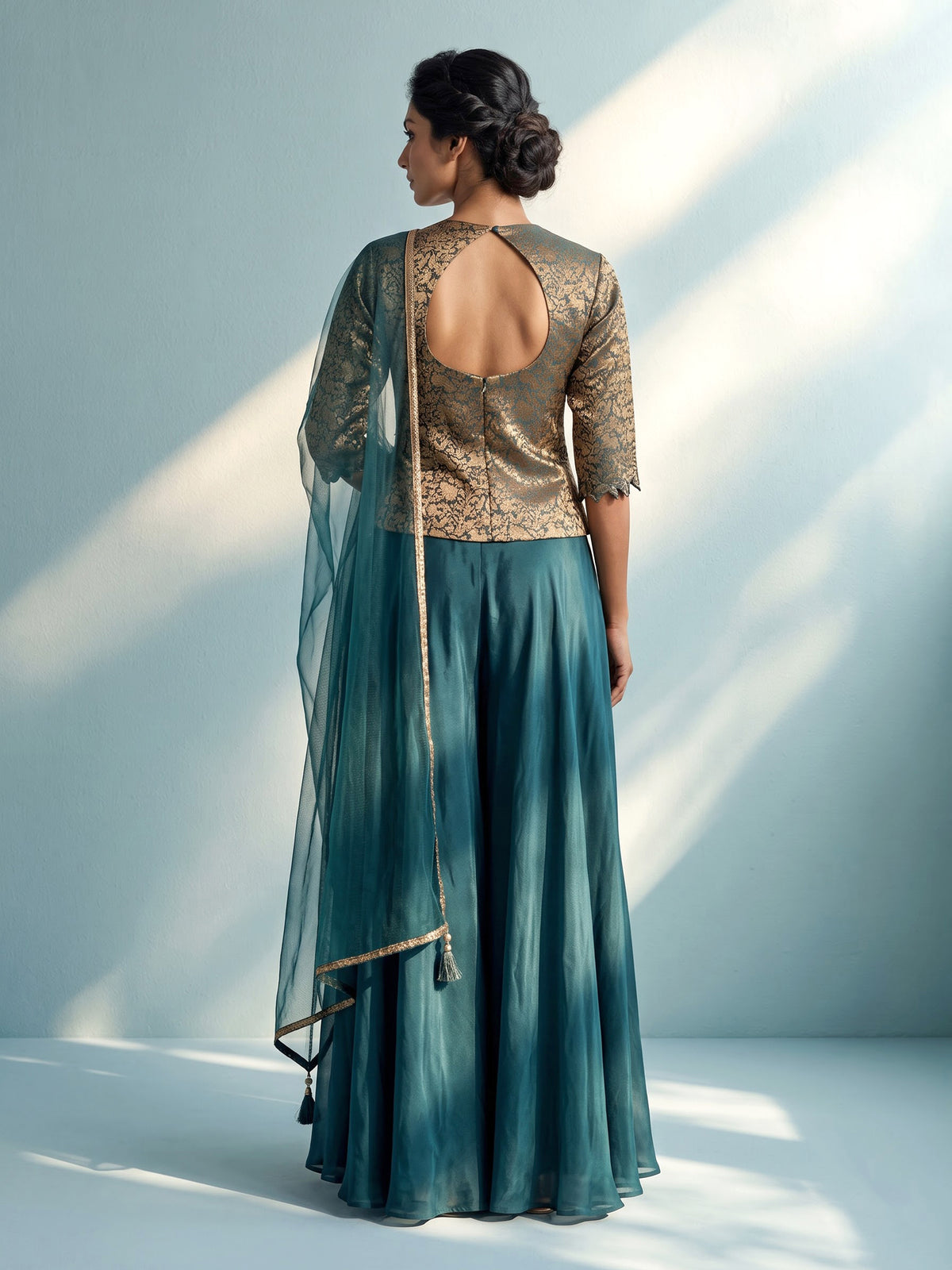 Peacock green banarasi top salwar suit with satin palazzo