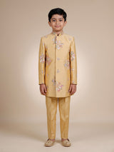 Beige silk boys indowestern set with intricate resham embellishments