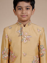 Beige silk boys indowestern set with intricate resham embellishments