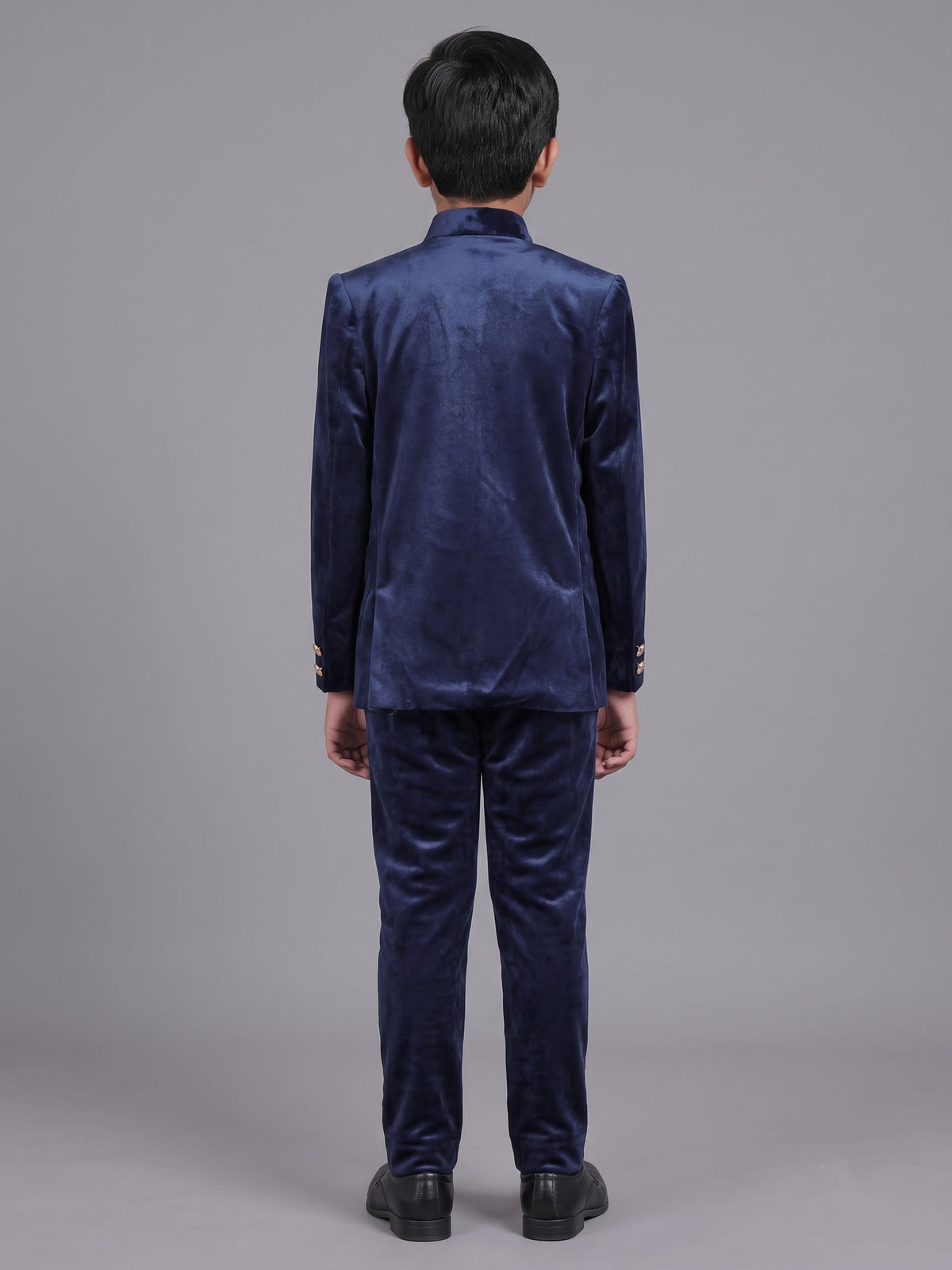 Navy velvet boys Jodhpuri suit with ornate crest detailing