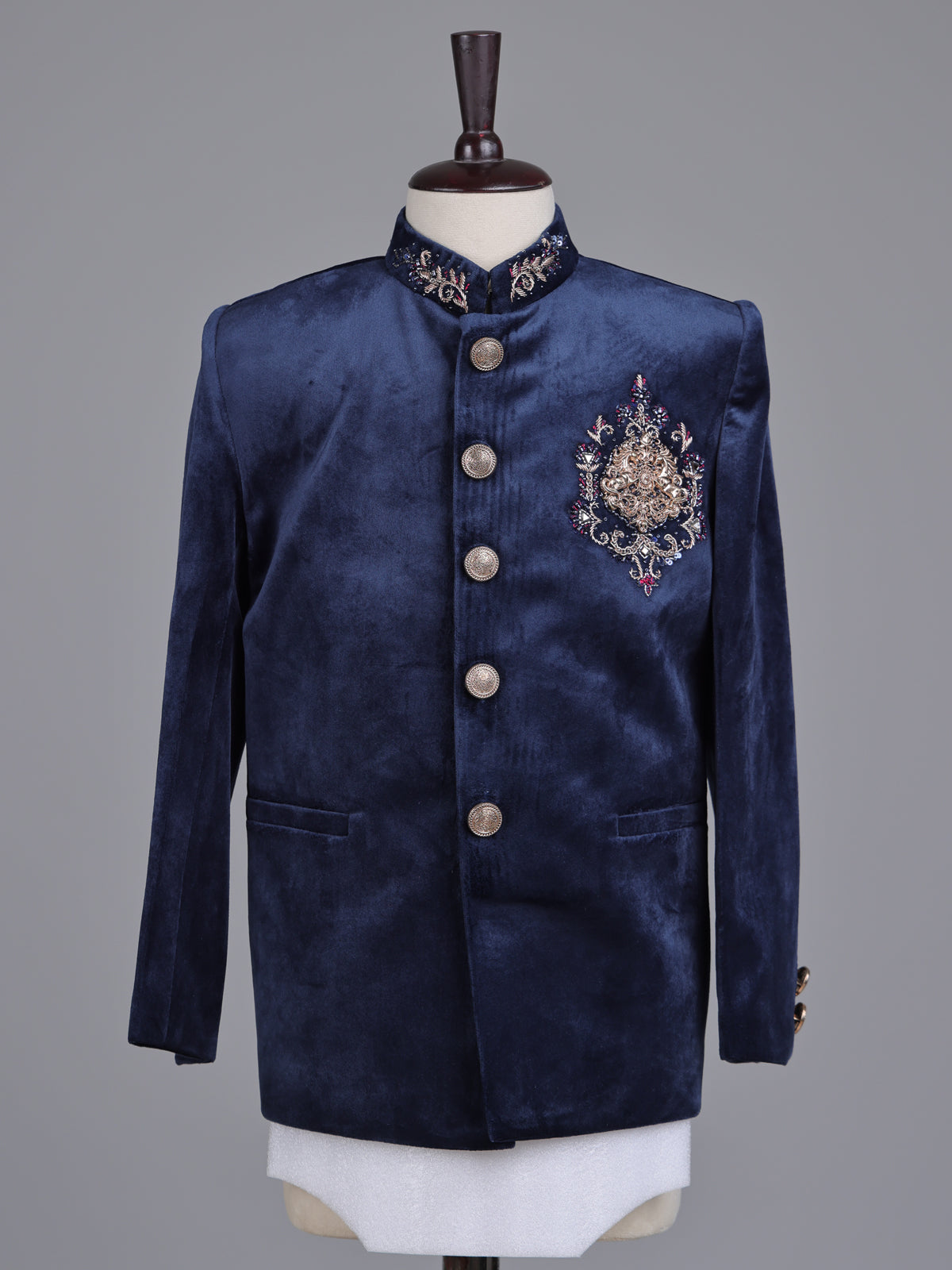 Navy velvet boys Jodhpuri suit with ornate crest detailing