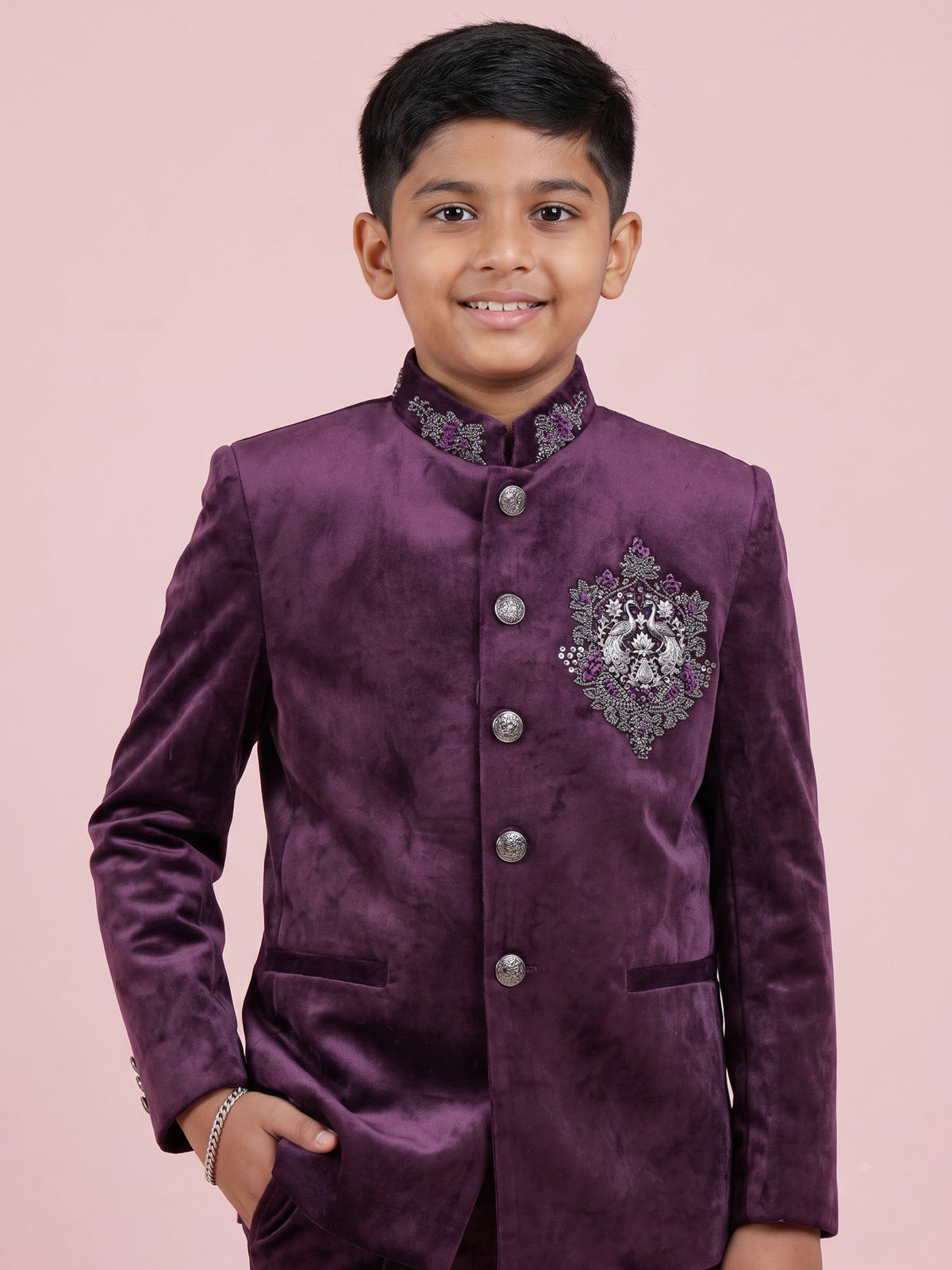Wine velvet boys Jodhpuri suit with handcrafted crest motif
