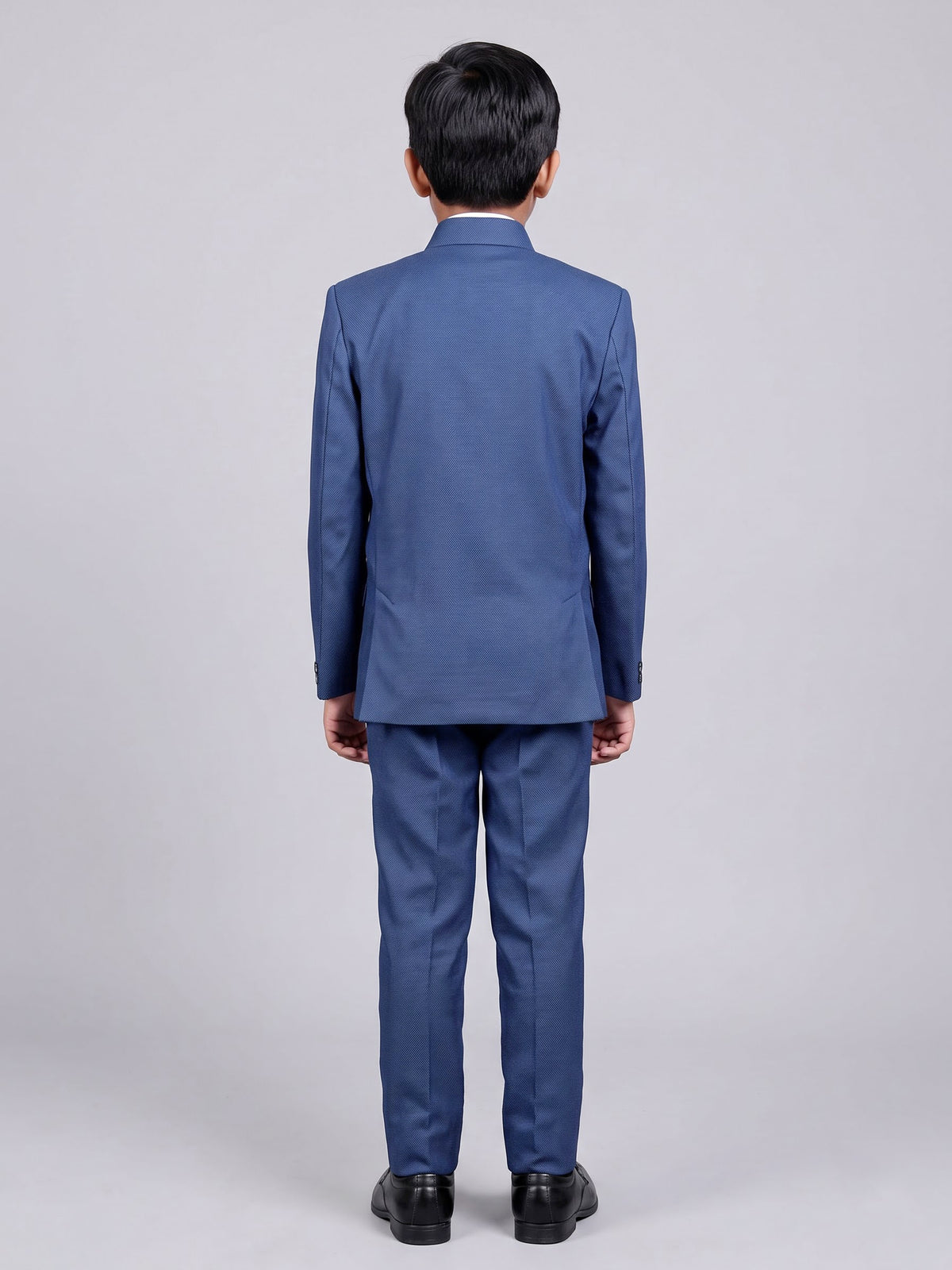 Blue terry rayon boys Jodhpuri suit with metallic brooch