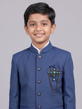 Blue terry rayon boys Jodhpuri suit with metallic brooch