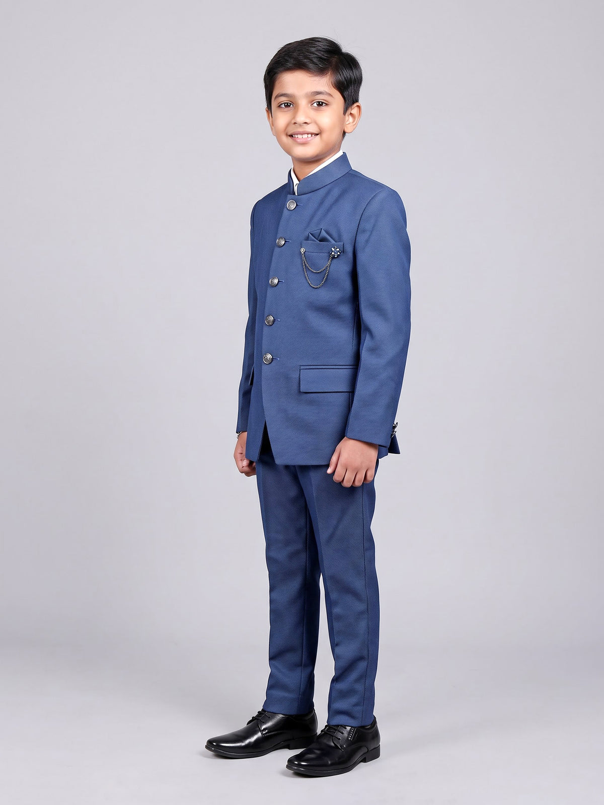 Blue terry rayon boys Jodhpuri suit with metallic brooch