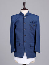 Blue terry rayon boys Jodhpuri suit with metallic brooch