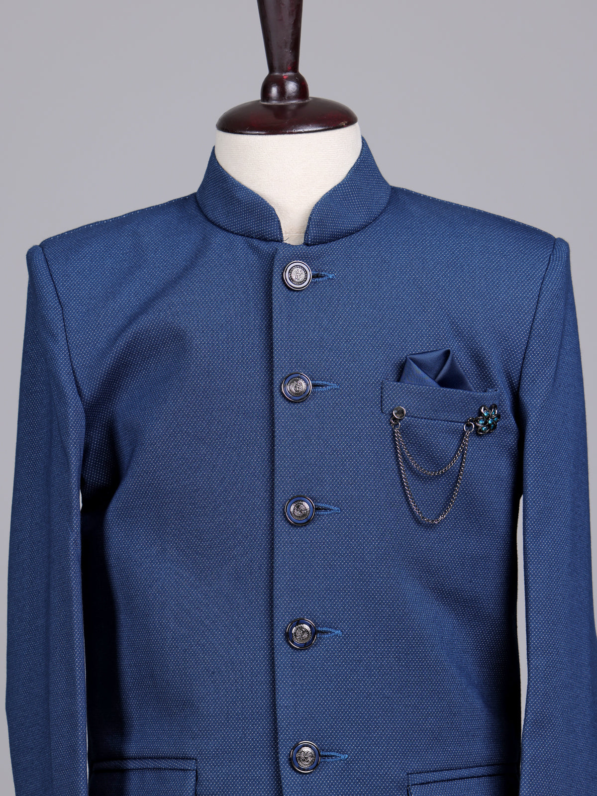 Blue terry rayon boys Jodhpuri suit with metallic brooch