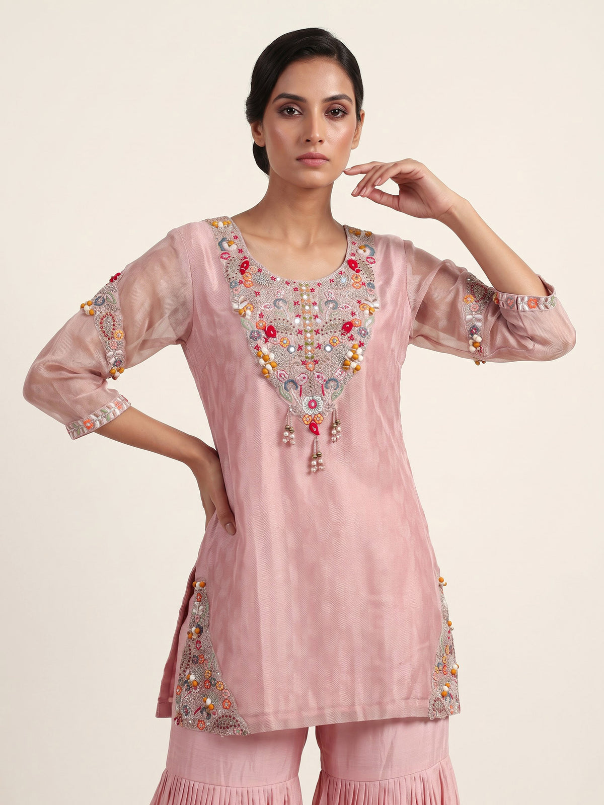 Light peach silk designer sharara suit with ornate embellishments