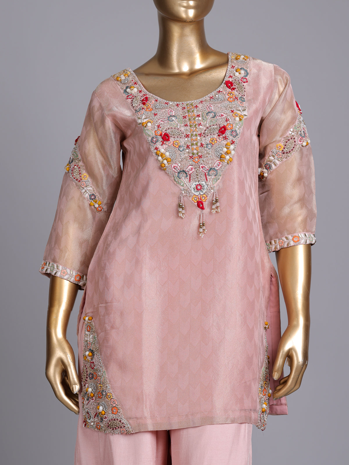 Light peach silk designer sharara suit with ornate embellishments