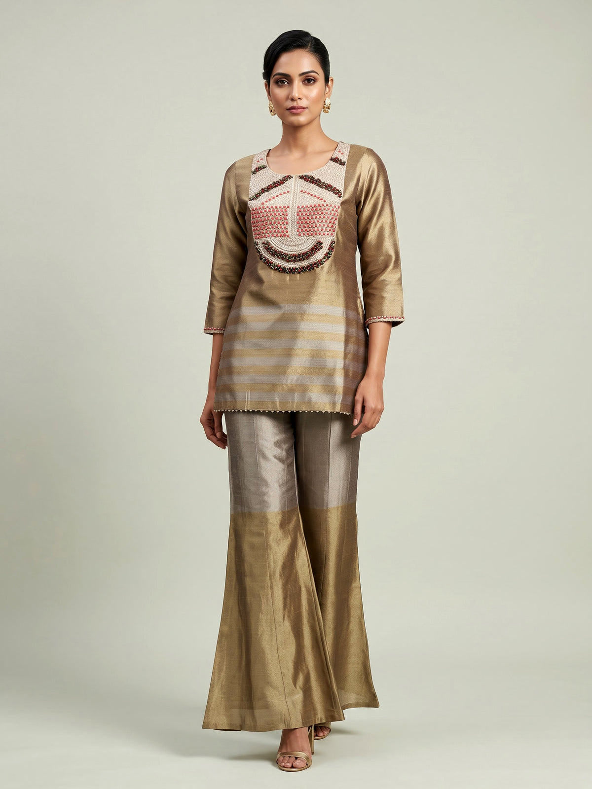 Gold silk yoke style palazzo suit with zardosi and pearls