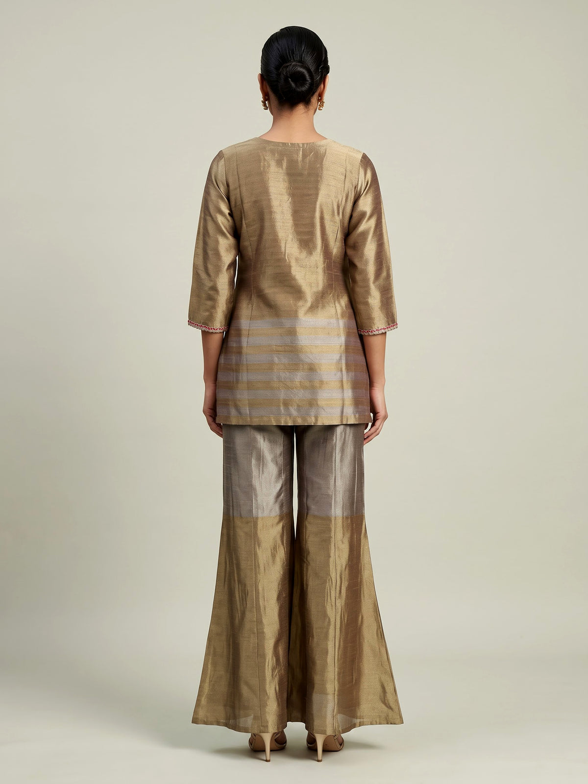 Gold silk yoke style palazzo suit with zardosi and pearls