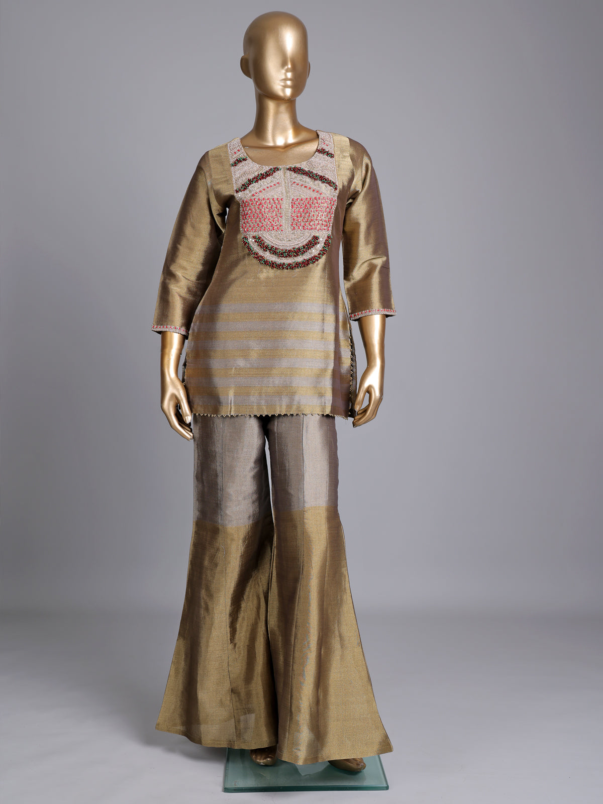 Gold silk yoke style palazzo suit with zardosi and pearls