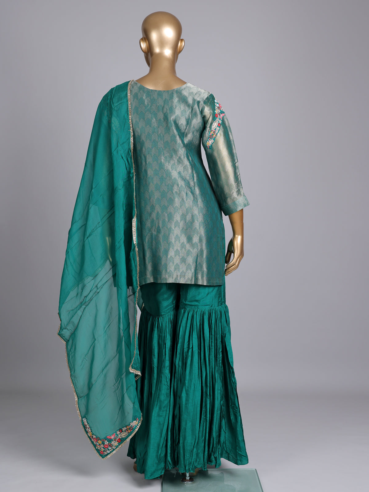 Rama green silk yoke style sharara suit with dupatta