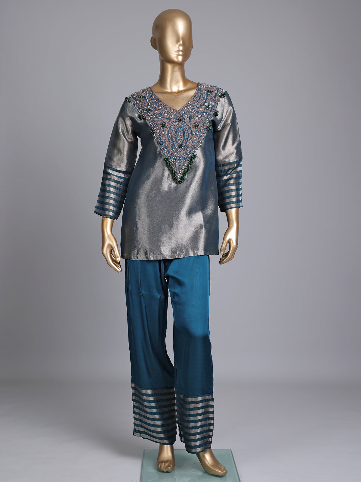 Peacock blue silk yoke style palazzo pant suit with embellishments