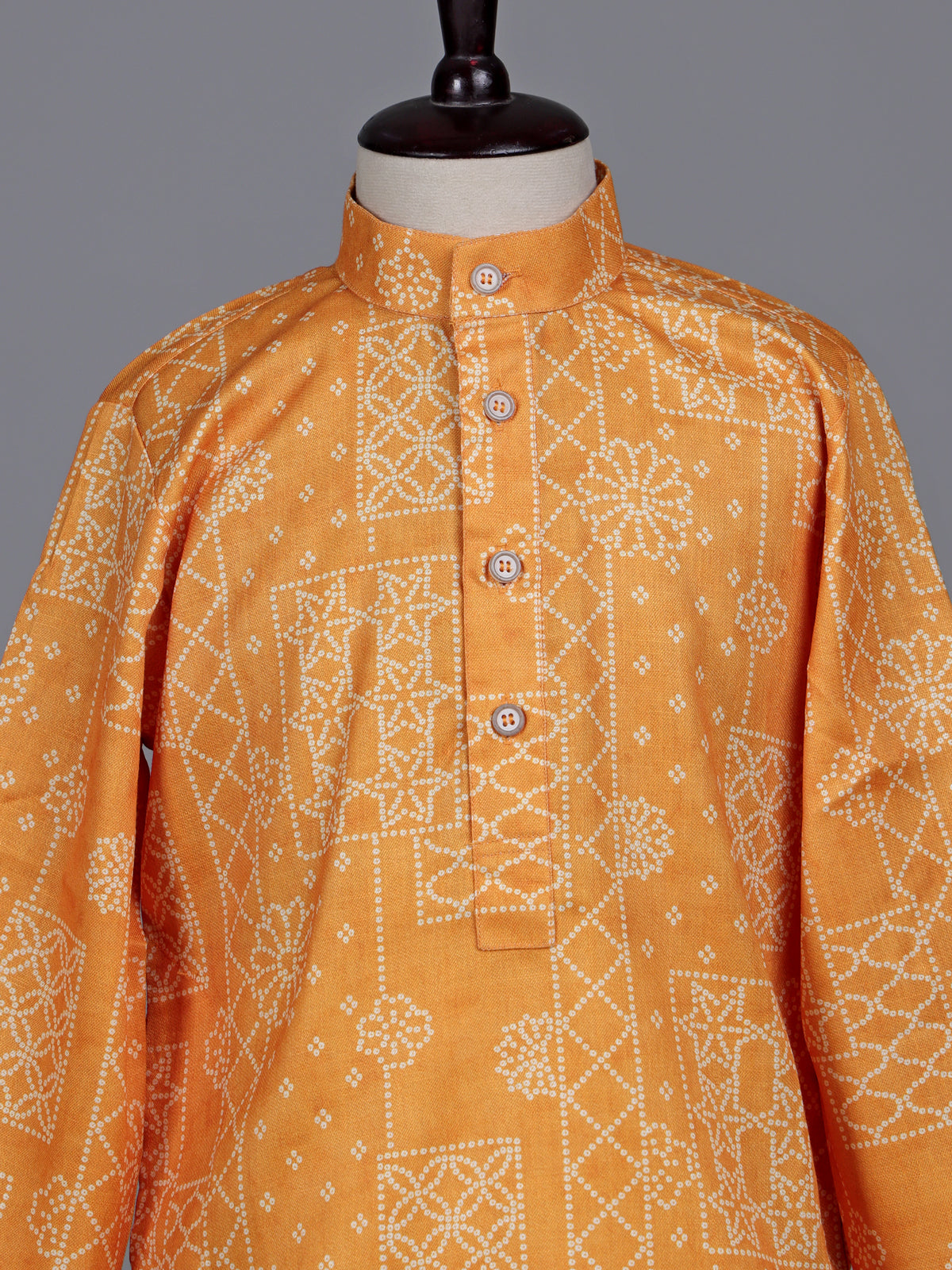 Light orange boys linen kurta suit with bandhani print