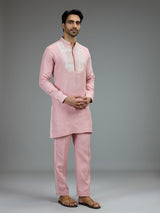 Pink charming mens kurta pajama with embroidered details