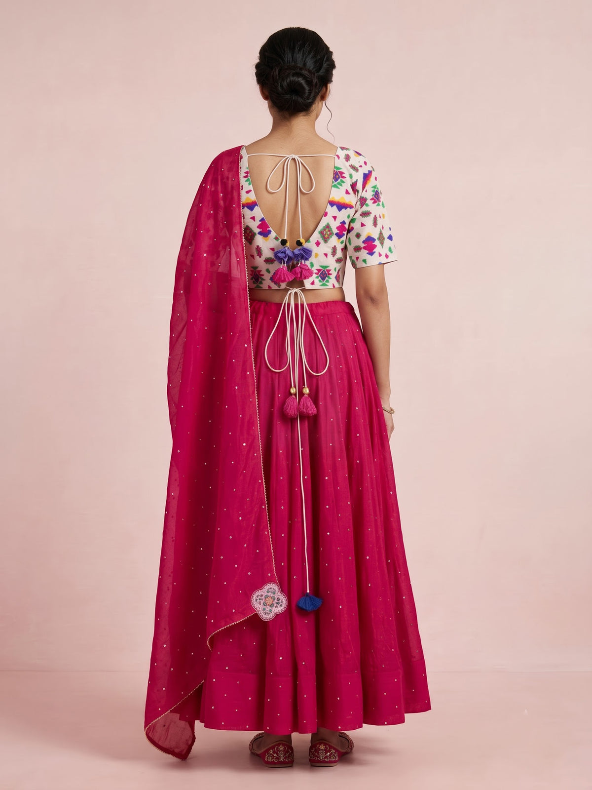 Red soft silk Navratri lehenga choli with charming stone accents