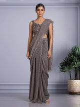 Brown designer net saree with zardosi embellished blouse detailing