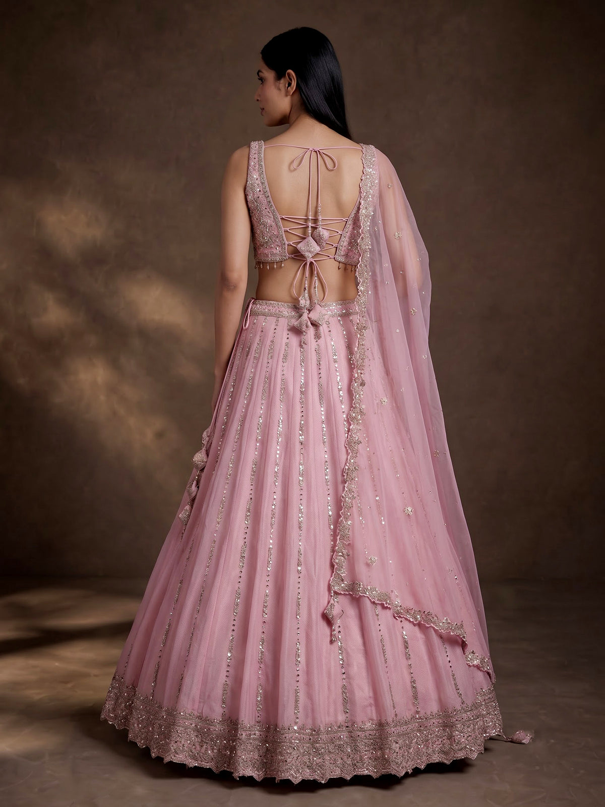 Pink silk lehenga choli with aabla diamond and tassel detailing