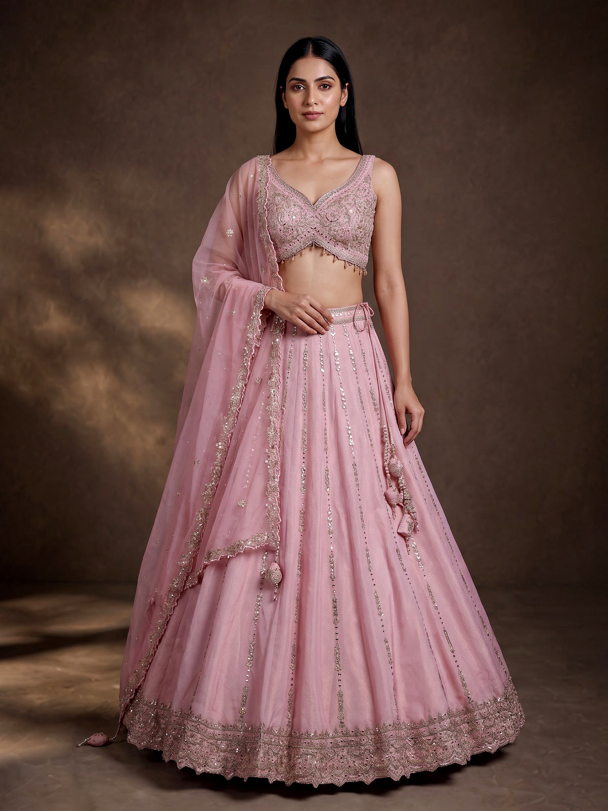 Pink silk lehenga choli with aabla diamond and tassel detailing