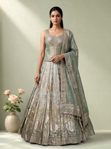 Pista green silk lehenga choli with mirror and zardosi work