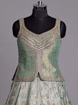 Pista green silk lehenga choli with mirror and zardosi work