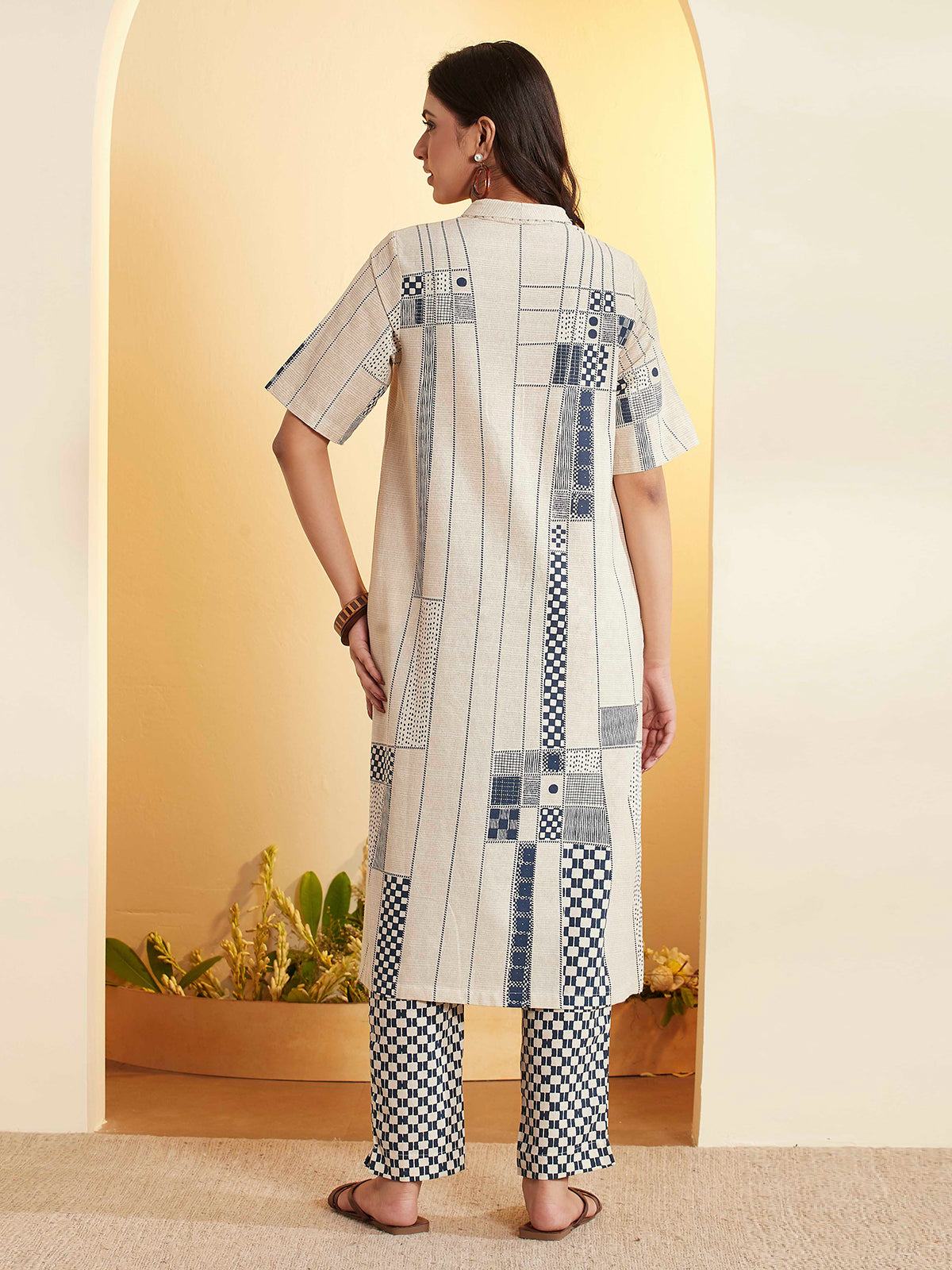 Beige a-line kurti set with printed detail