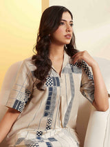 Beige a-line kurti set with printed detail