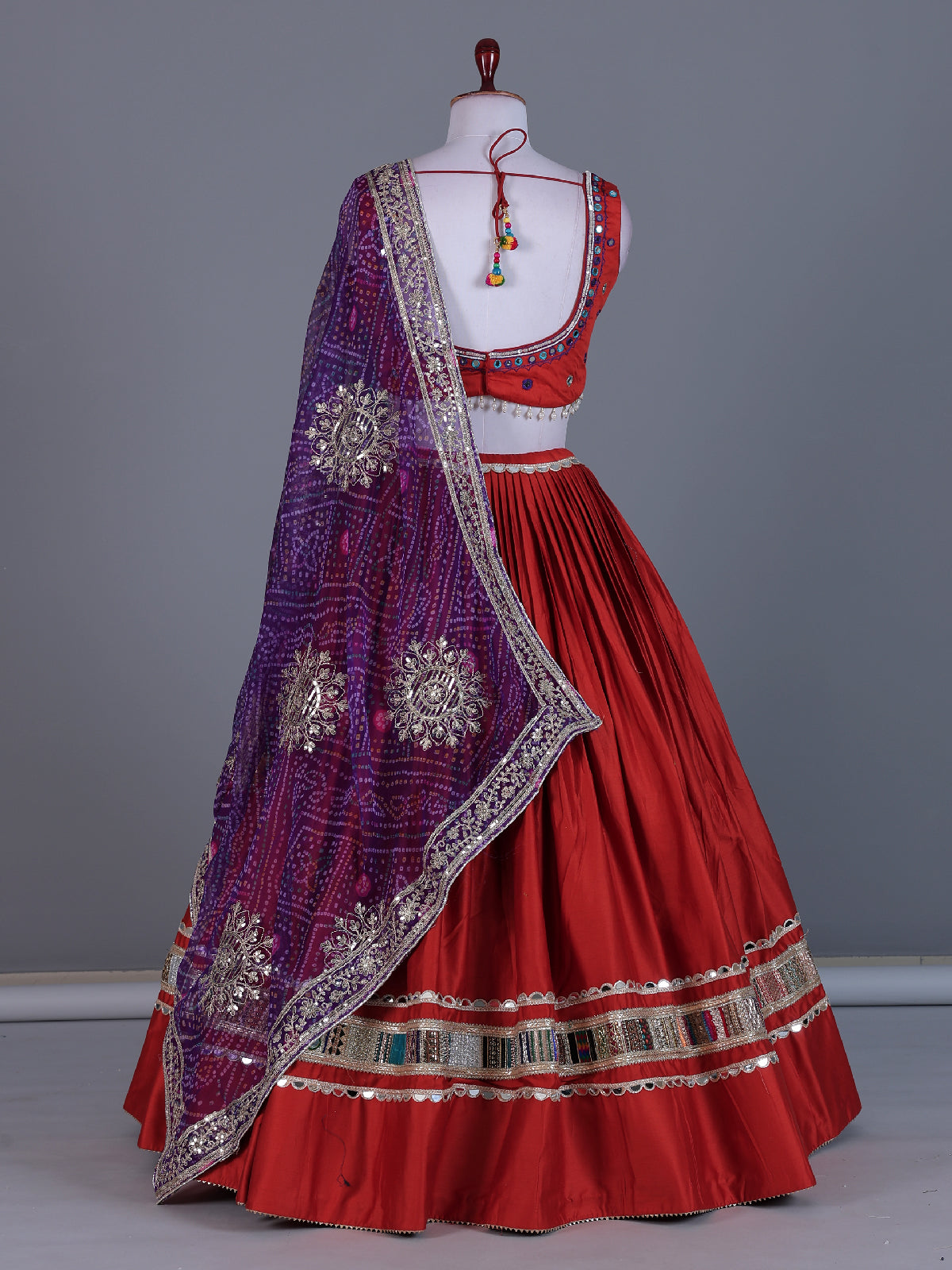 Brick red cotton silk navratri lehenga choli with bandhani dupatta