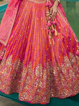 Rani pink silk lehenga choli with embellished dupatta