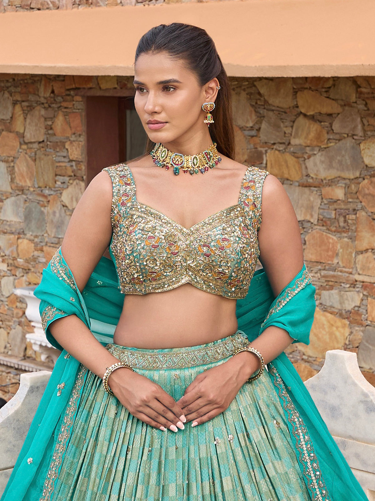 Aqua silk lehenga choli with checks texture and embellished dupatta