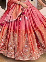 Pink silk lehenga choli with shaded dupatta and resham embellishments