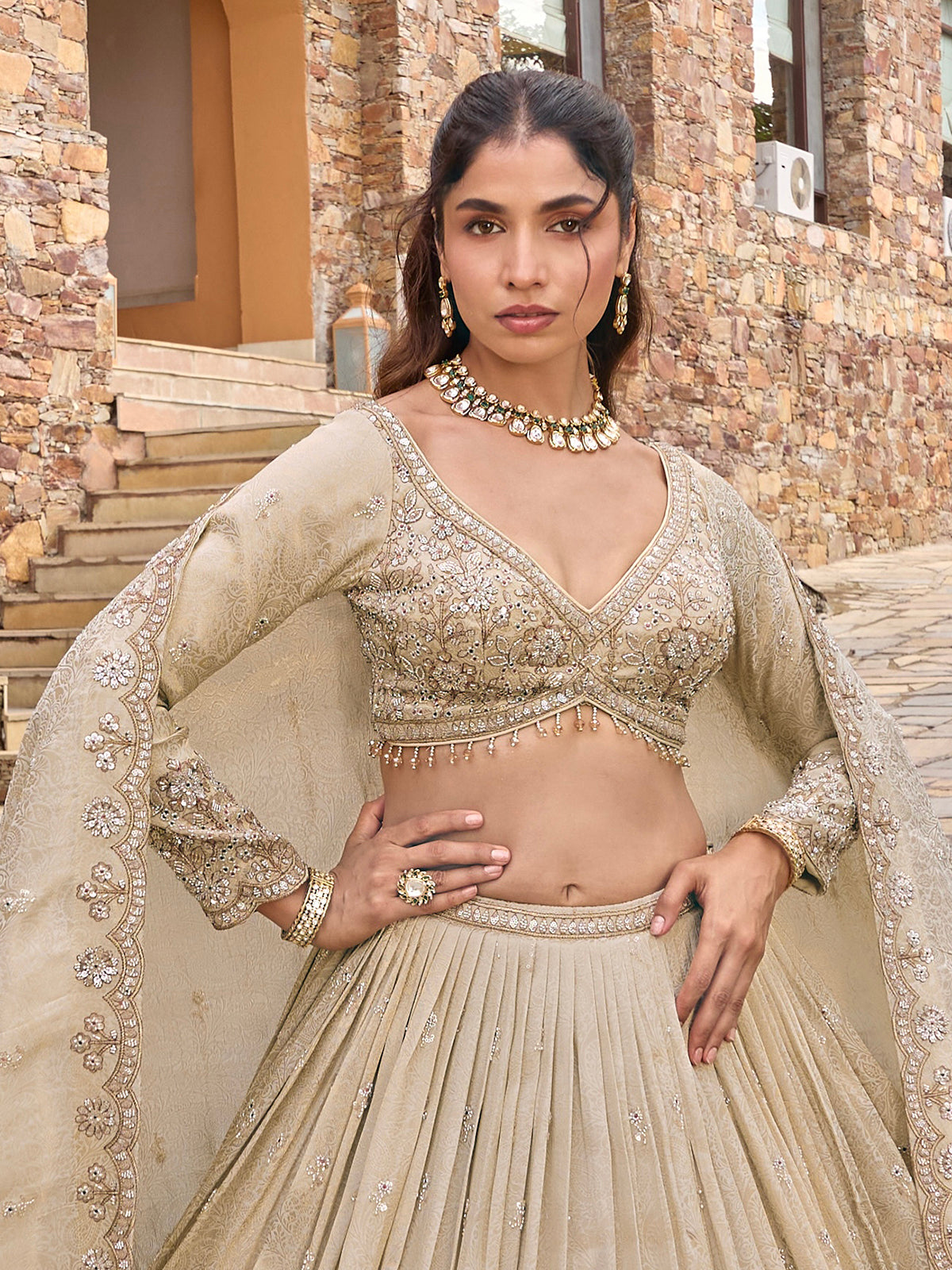 Beige silk lehenga choli with designer dupatta and zari texture