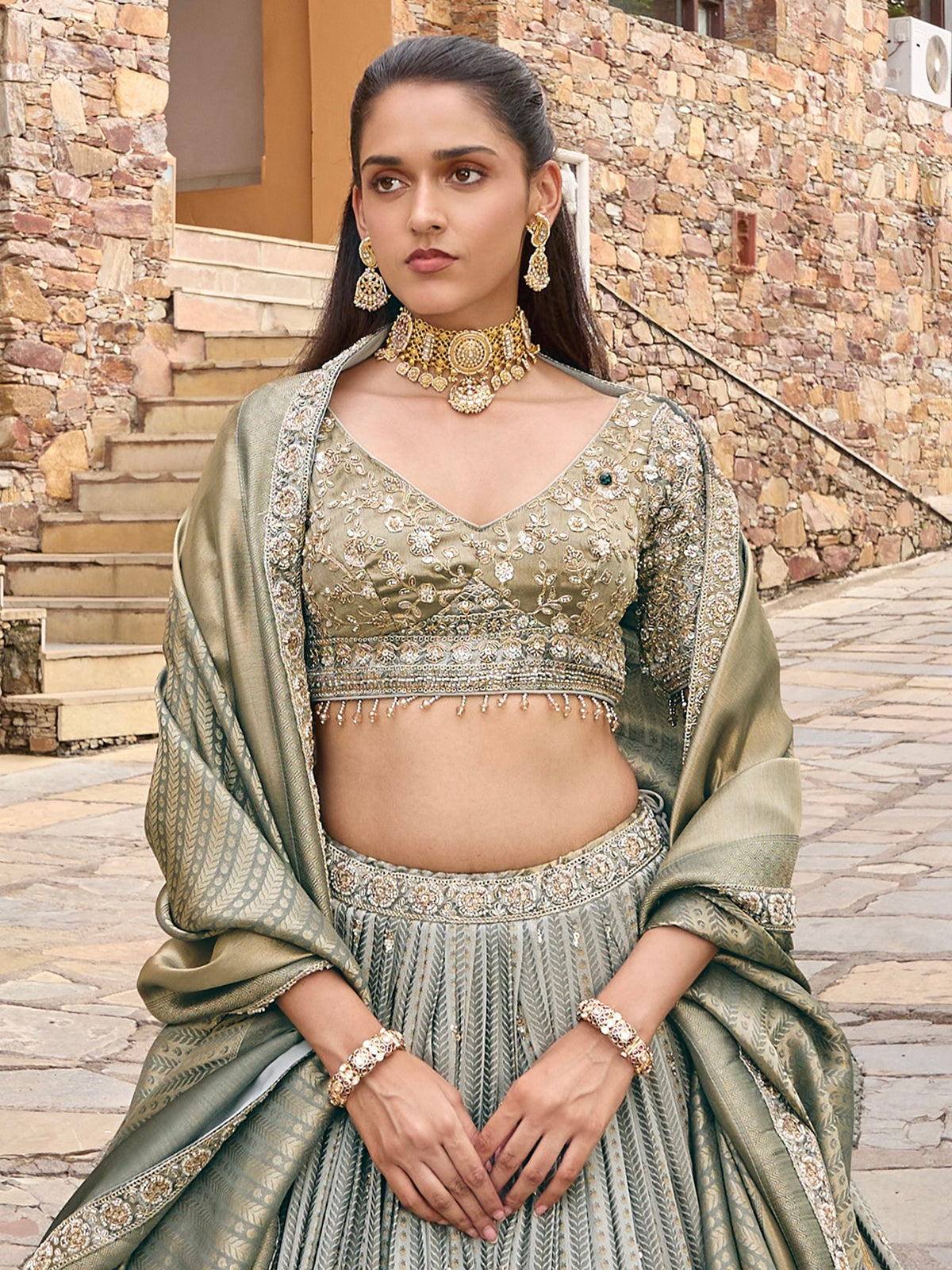 Grey silk lehenga choli with peacock motifs and shaded dupatta