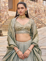 Grey silk lehenga choli with peacock motifs and shaded dupatta