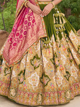 Mehendi green silk lehenga choli with colorful motifs and contrast dupatta