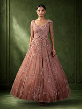 Dusty peach ball gown with floral embellishments and fringe