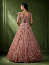 Dusty peach ball gown with floral embellishments and fringe