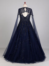 Midnight navy ball gown with embellished cape and flared skirt