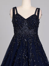 Midnight navy ball gown with embellished cape and flared skirt