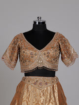 Antique gold banarasi silk lehenga choli with tissue silk dupatta