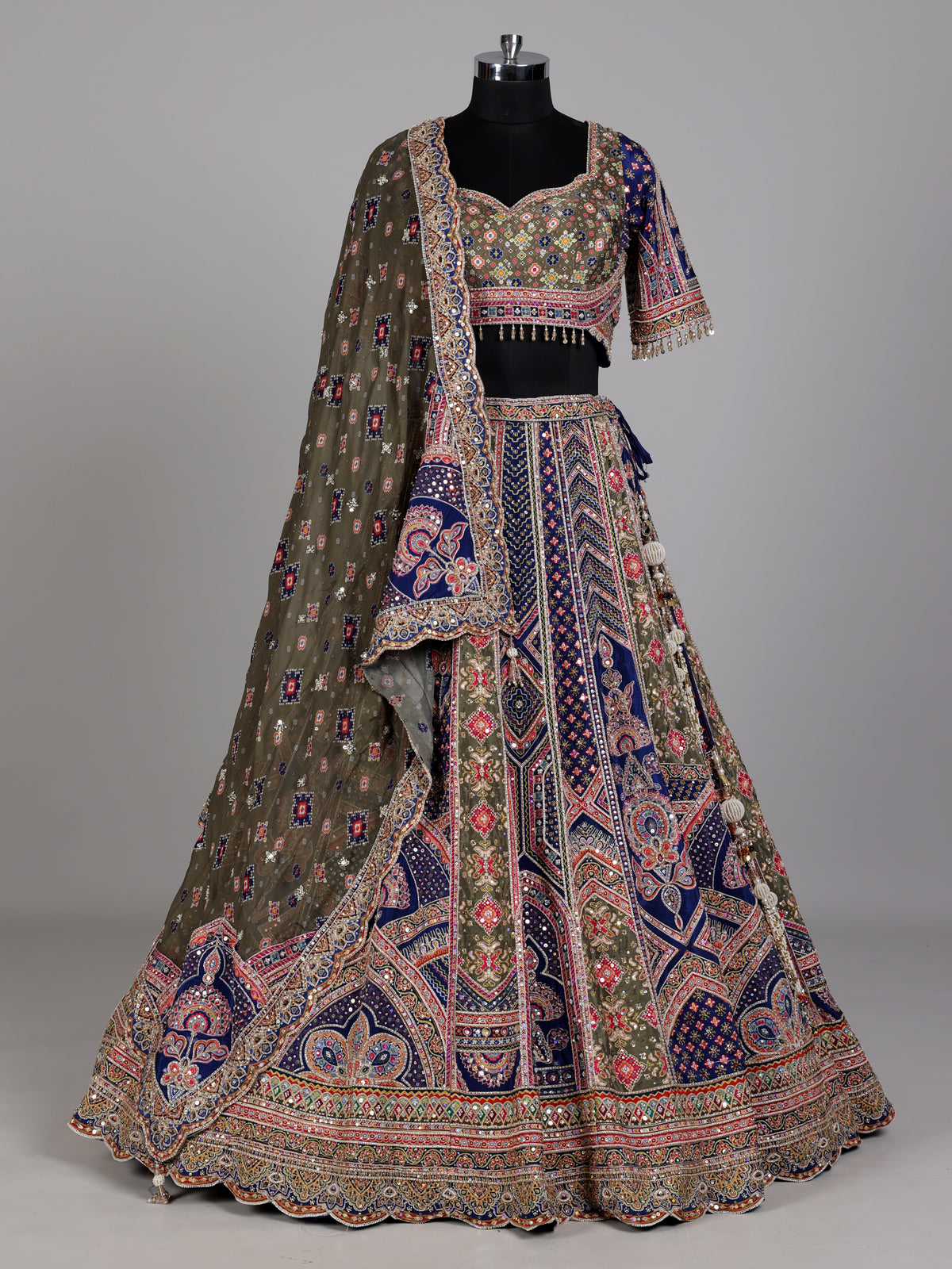 Blue olive lehenga choli with traditional bandhani inspired motifs