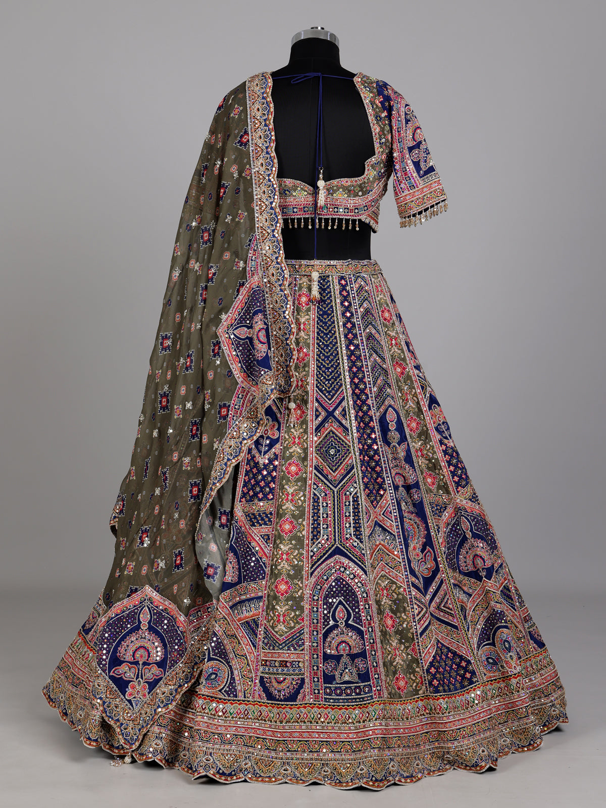 Blue olive lehenga choli with traditional bandhani inspired motifs