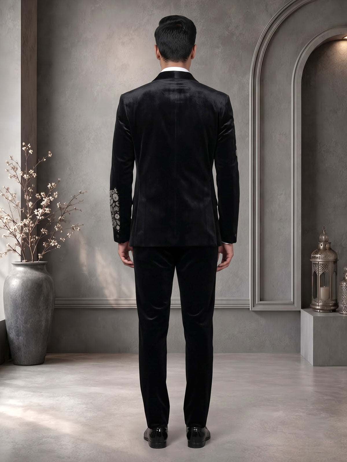 Black velvet tuxedo suit with crystal floral embellishments