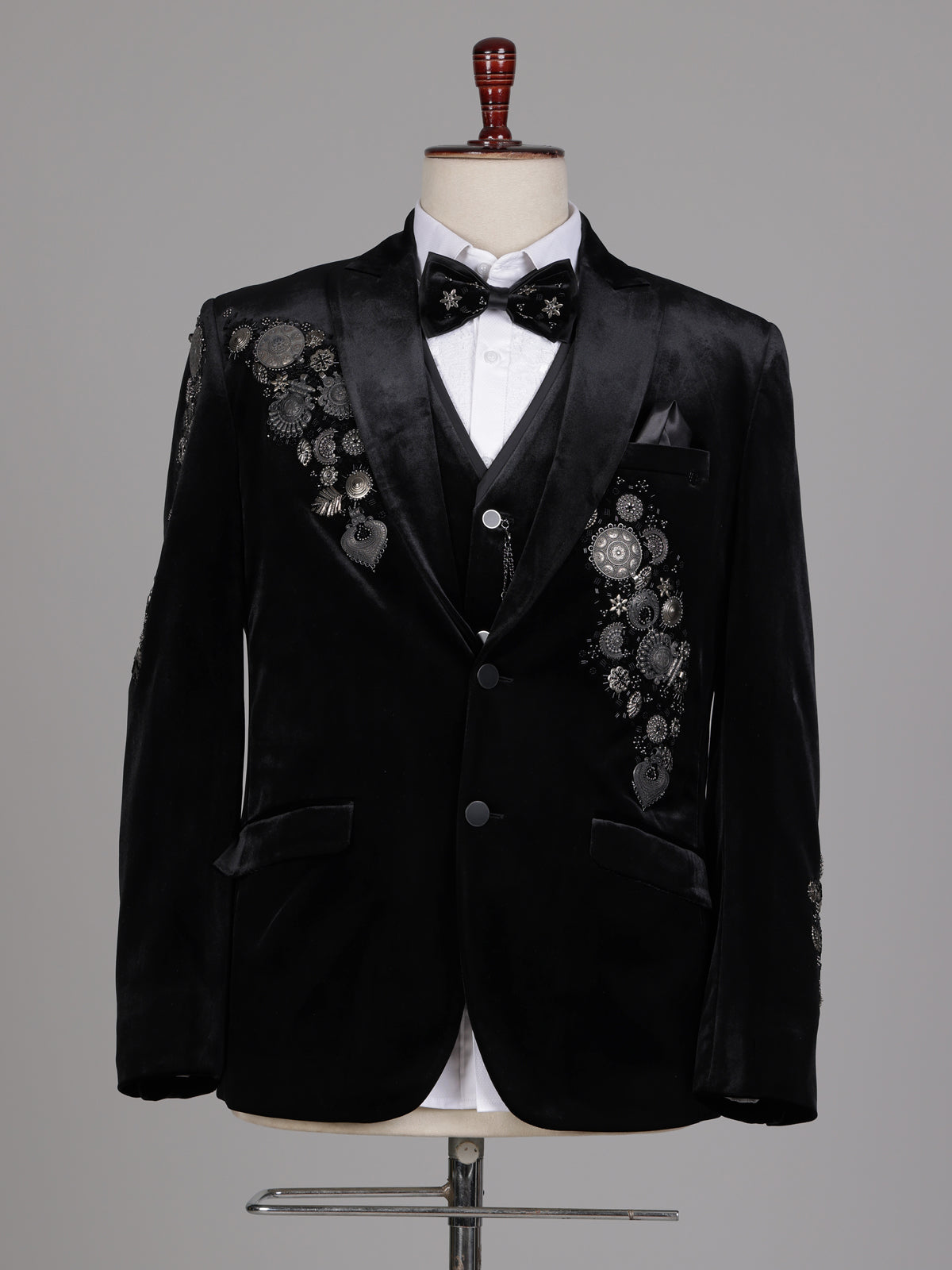 Black velvet tuxedo suit with crystal floral embellishments