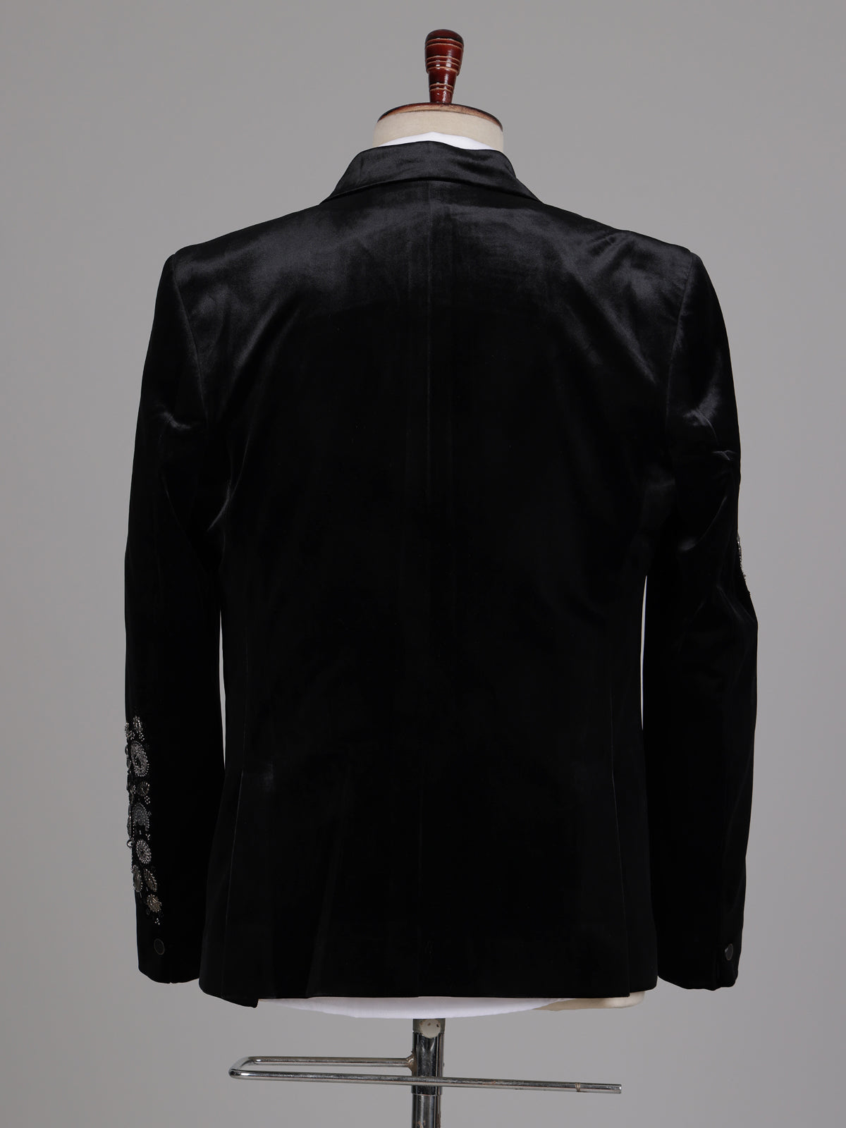 Black velvet tuxedo suit with crystal floral embellishments