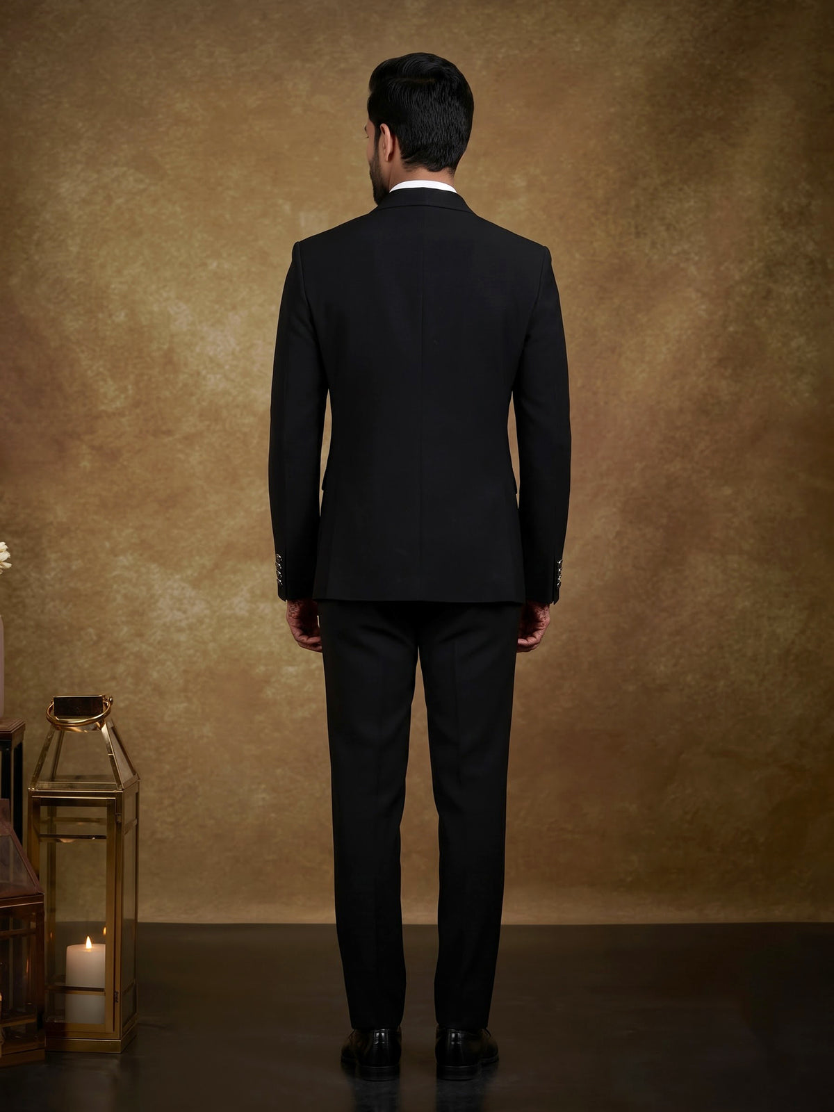 Black terry rayon tuxedo suit with floral cutdana embroidery
