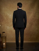 Black terry rayon tuxedo suit with floral cutdana embroidery